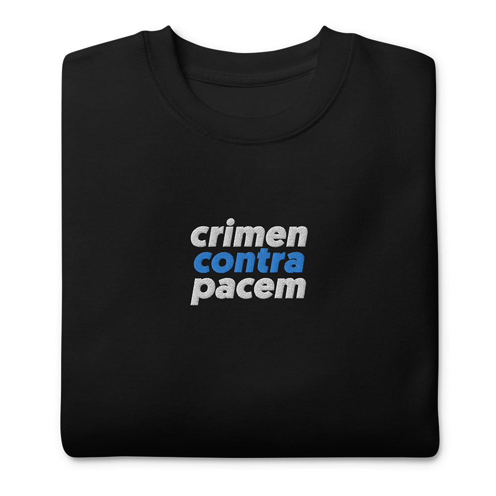 Folded Black Sweatshirt "Crimen Contra Pacem" with embroidery on the center front.