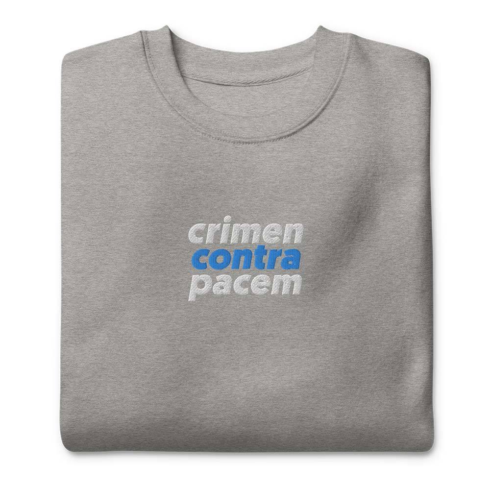 Folded Sweatshirt "Crimen Contra Pacem" with white and blue embroidery on the center front.