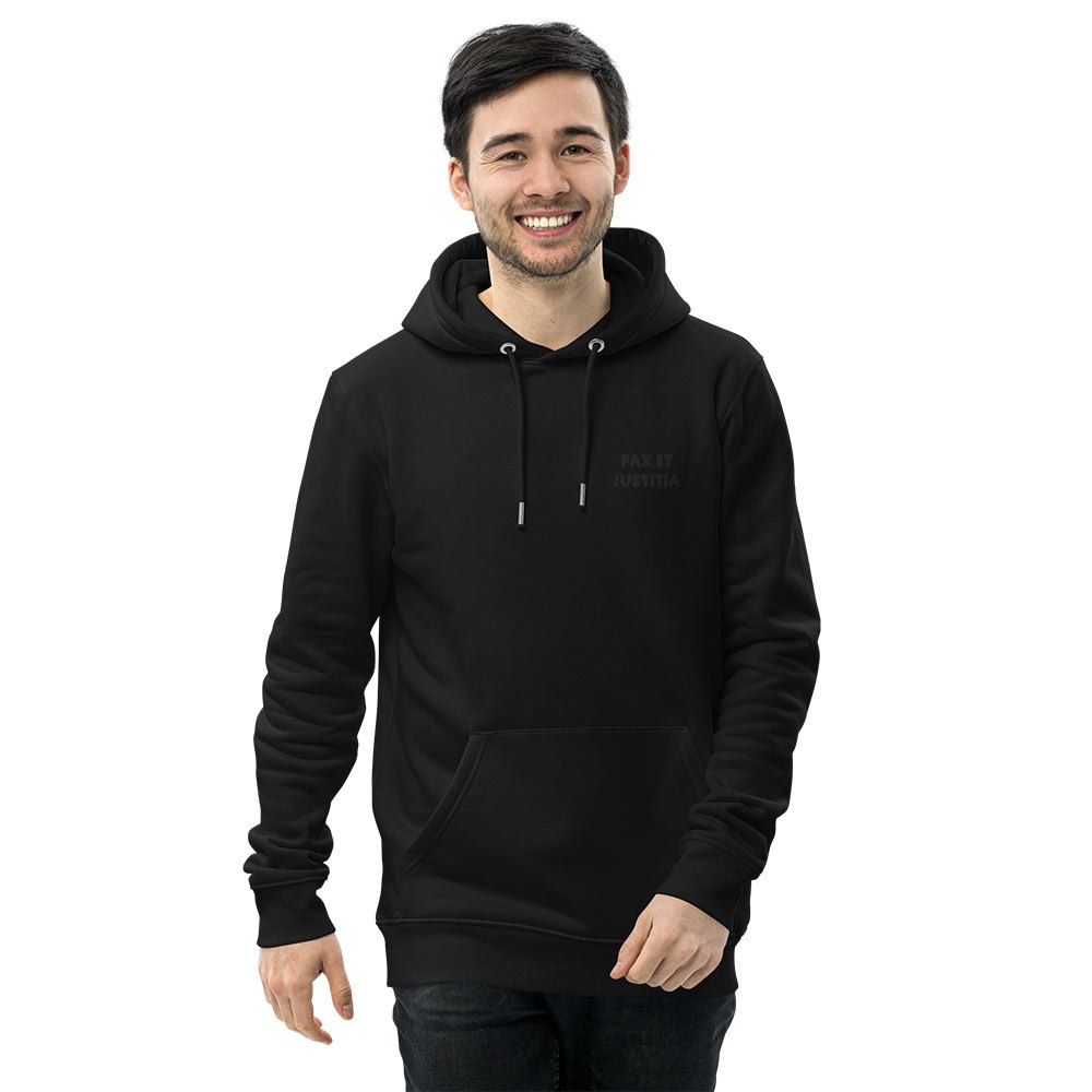 All-Black Minimalist Hoodie "Pax et Justitia". Front view of the hoodie on a male model.